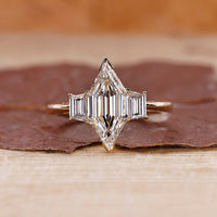 3 stone ring with unique design and beautiful craftsmanship.