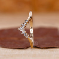 Prong setting wedding band showing off its detailed craftsmanship.