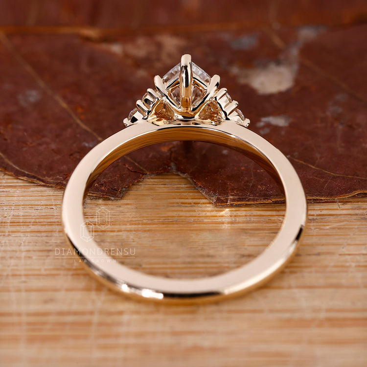 Handmade diamond ring with 8 prong marquise center stone.