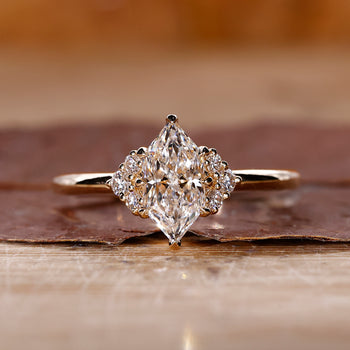 Dutch marquise engagement ring in yellow gold with solitaire setting.