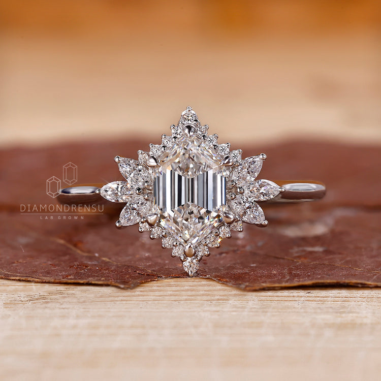 Six prong setting engagement ring with white gold band.