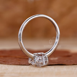 Diamondrensu pear cut solitaire engagement ring.