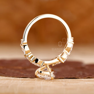 Lab Grown Diamond placed in a round and marquise side stone ring.