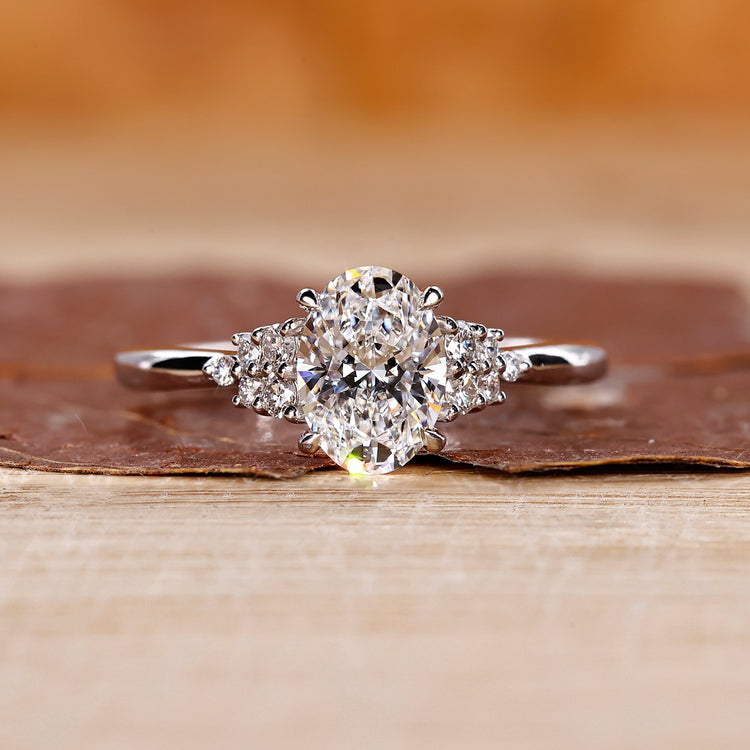 Oval Diamond Engagement Ring with a unique design in white gold.