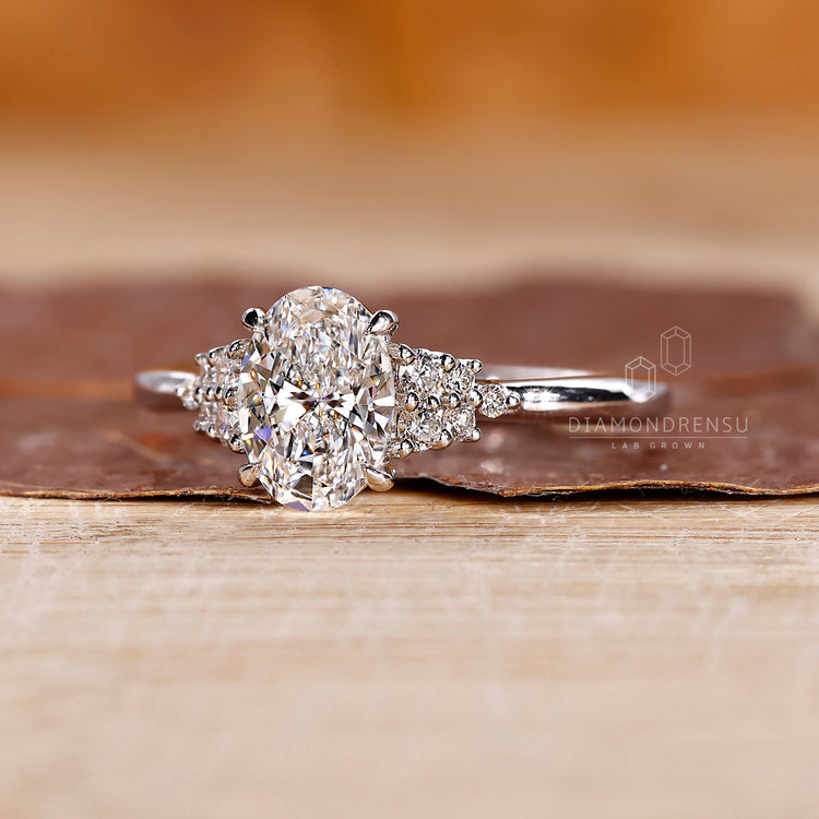 Round cut diamond ring in a handmade design with white gold band.