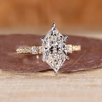 Lab grown diamond Dutch marquise ring with cathedral and hidden halo design.