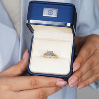 Vintage style Art Deco engagement ring with a princess cut.