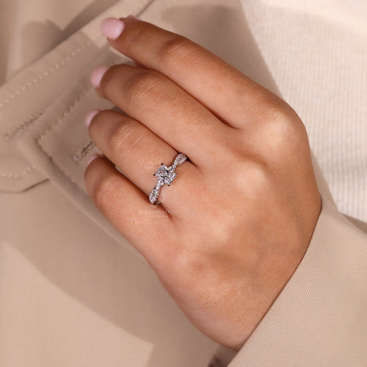 Diamondrensu engagement ring with 4 prong claw setting.