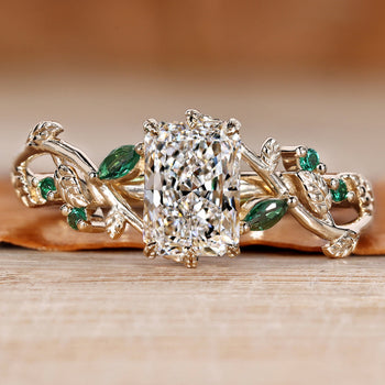 Nature inspired engagement ring with a radiant center stone.