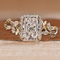 Radiant cut engagement ring with nature inspired style and halo design.