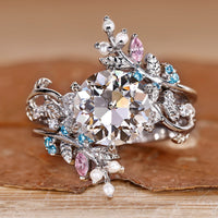 Nature inspired bridal set with round diamond ring.