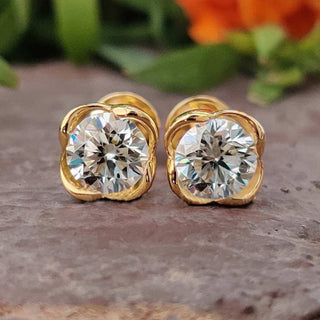 Round moissanite stud earrings in flower design