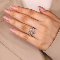 Marquise wedding ring with open gap setting.