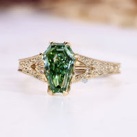 Coffin cut diamond ring with milgrain details.