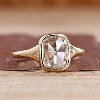 IGI certified cushion rose cut diamond ring with bezel setting.