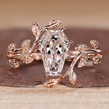 Coffin diamond ring with nature inspired style and solitaire design.