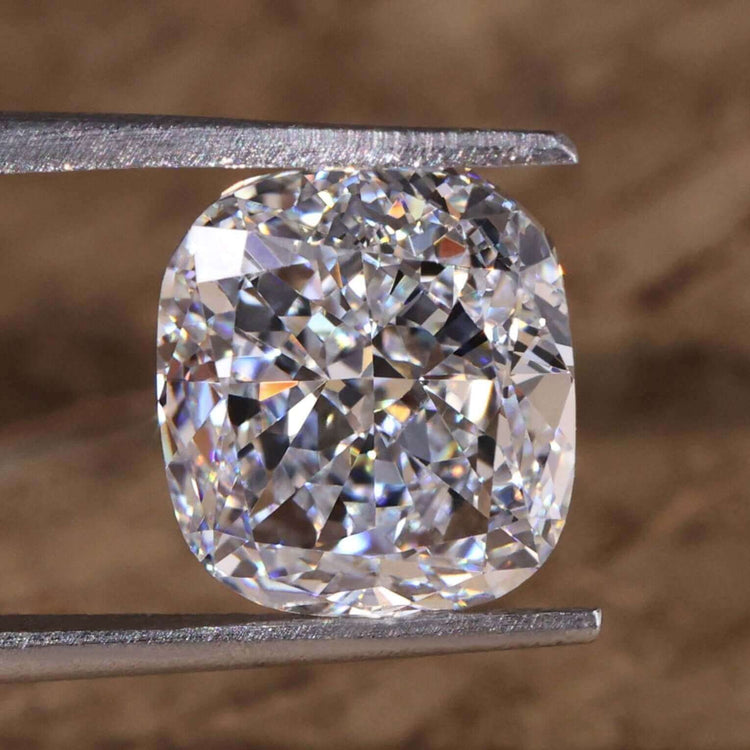 This lab grown cushion cut diamond is IGI certified.