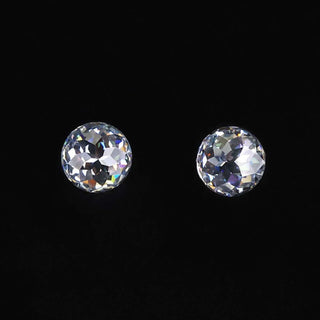 Pair of round rose cut moissanite stones with total carat weight from 0.50 to 4.0.