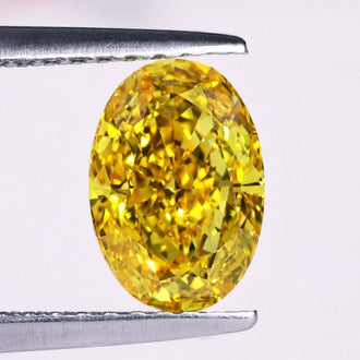 Oval yellow diamond 1 carat loose stone.