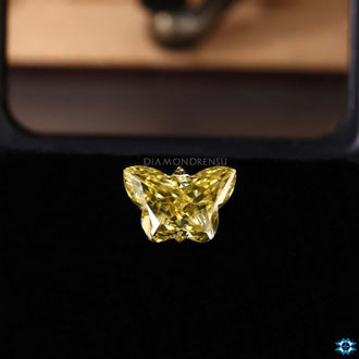 Yellow Moissanite loose stone in rare Butterfly cut.
