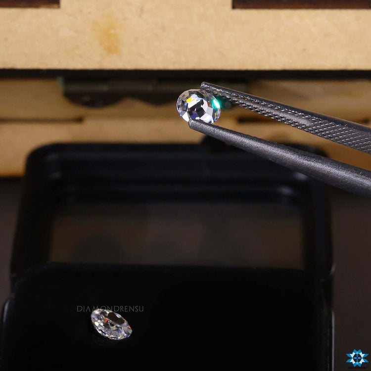 Pair of round rose cut moissanite stones designed for stud earrings and custom settings.