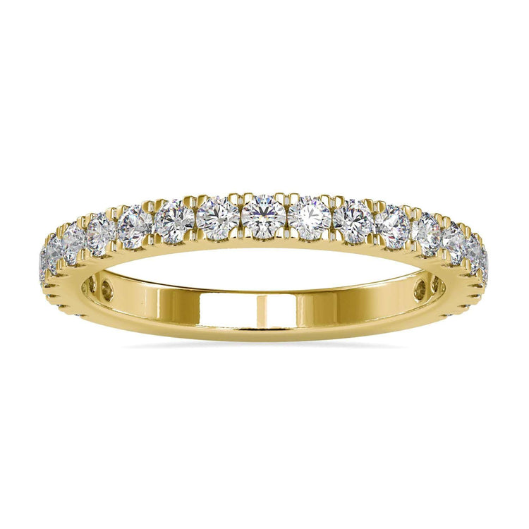 Gold wedding band with round diamond and semi eternity design.