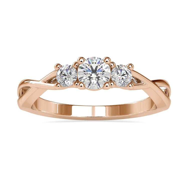 3 stone engagement ring featuring Lab Grown Diamonds and a twisted ring design.