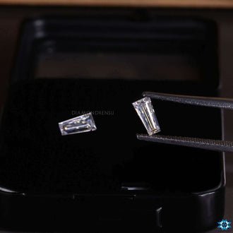 Colorless tapered baguette moissanite stone pair.