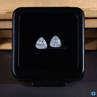 Loose stones featured in Antique Trillion Cut for unique pieces.