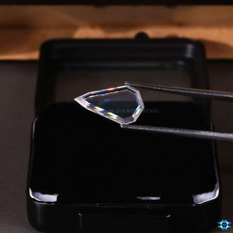 Loose moissanite with pear-shaped portrait cut.