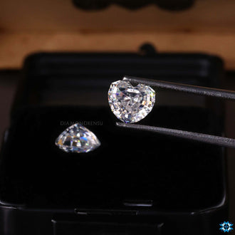 Loose moissanite stones shaped in Heart Cut style.