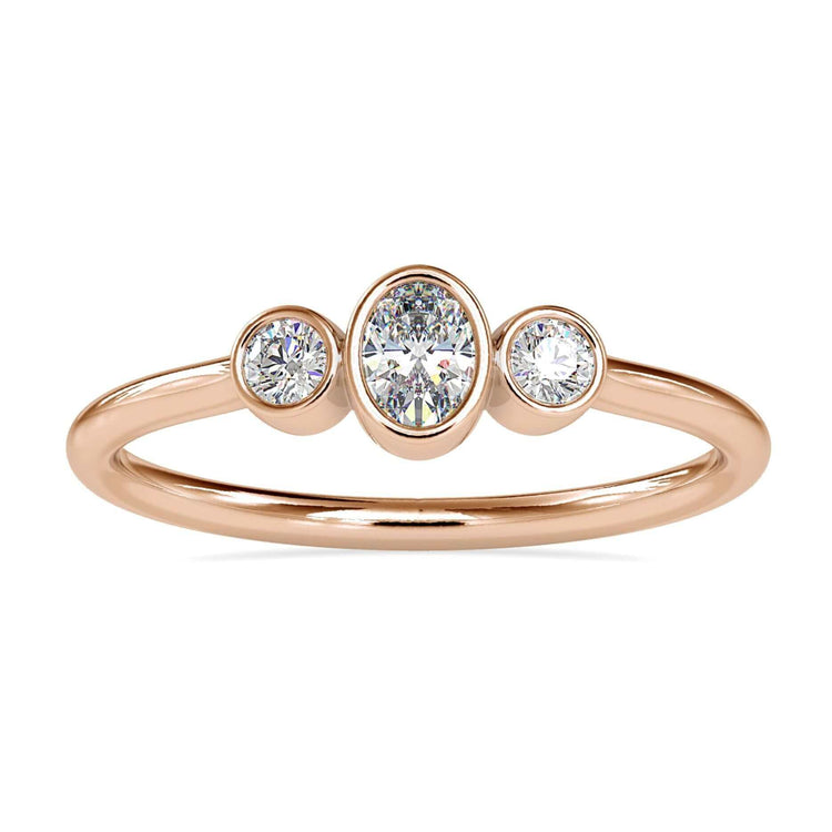 Bezel set engagement ring featuring a 2 carat oval diamond in white gold