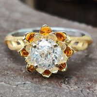 Floral engagement ring with intricate petal details for timeless beauty.
