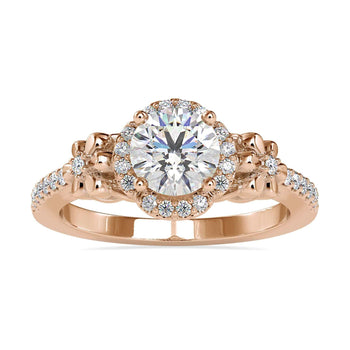 Floral halo engagement ring with a round diamond and pave setting.