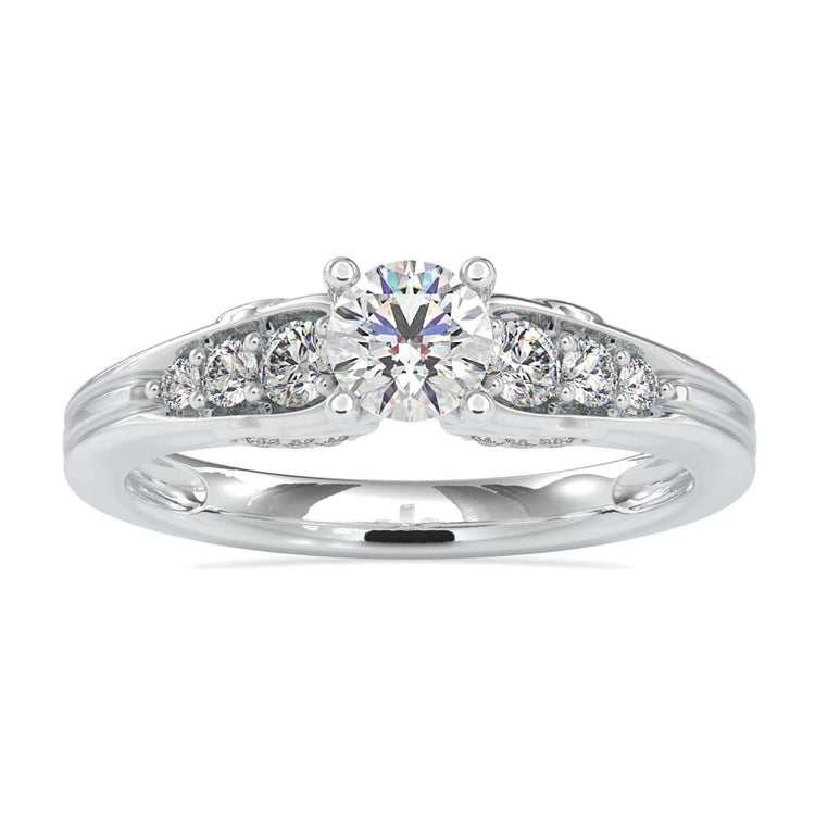Circle Diamond Engagement Ring with a four prong setting and side stones.