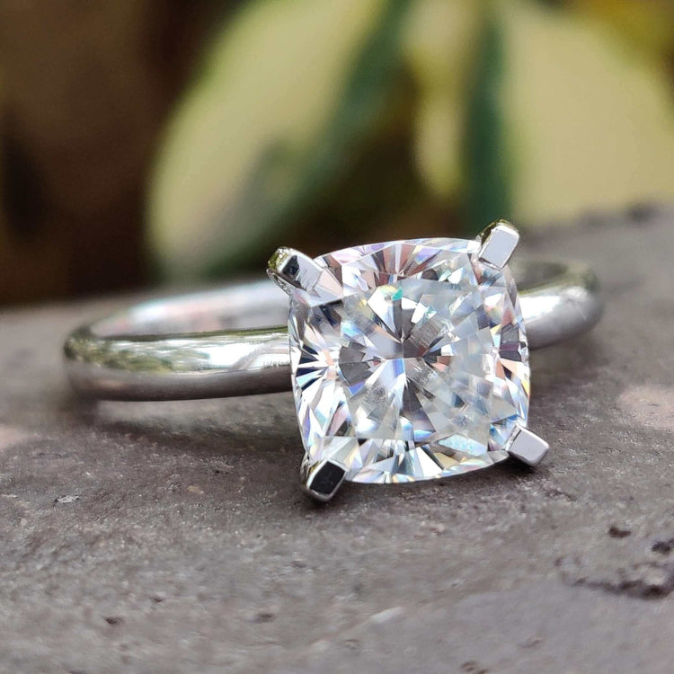 Elegant cushion cut engagement ring with sparkling clarity.