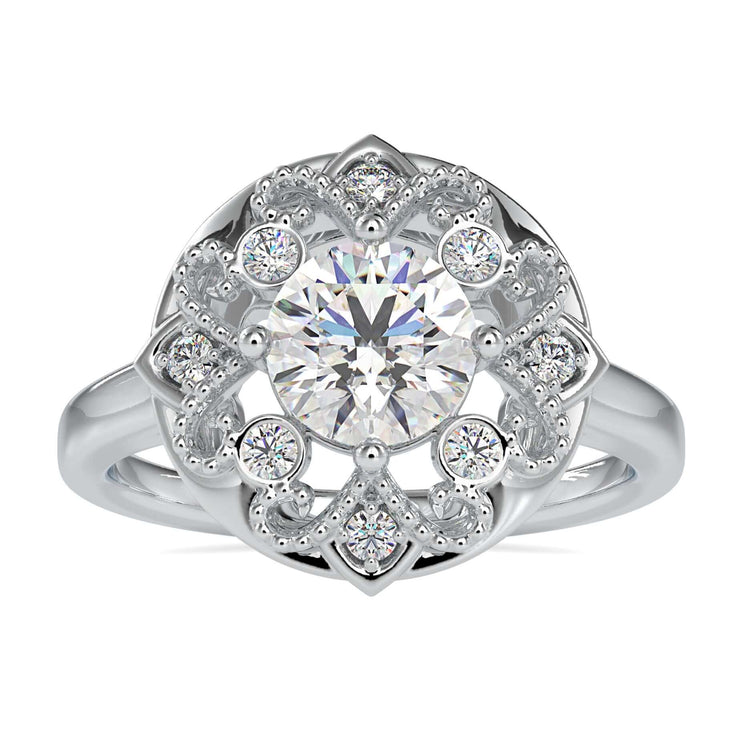 Art deco engagement ring with intricate artisan design and round diamond