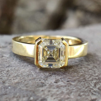 An elegant asscher engagement ring, perfect for celebrating special moments.