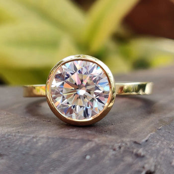 Elegant round cut engagement ring in a classic design.