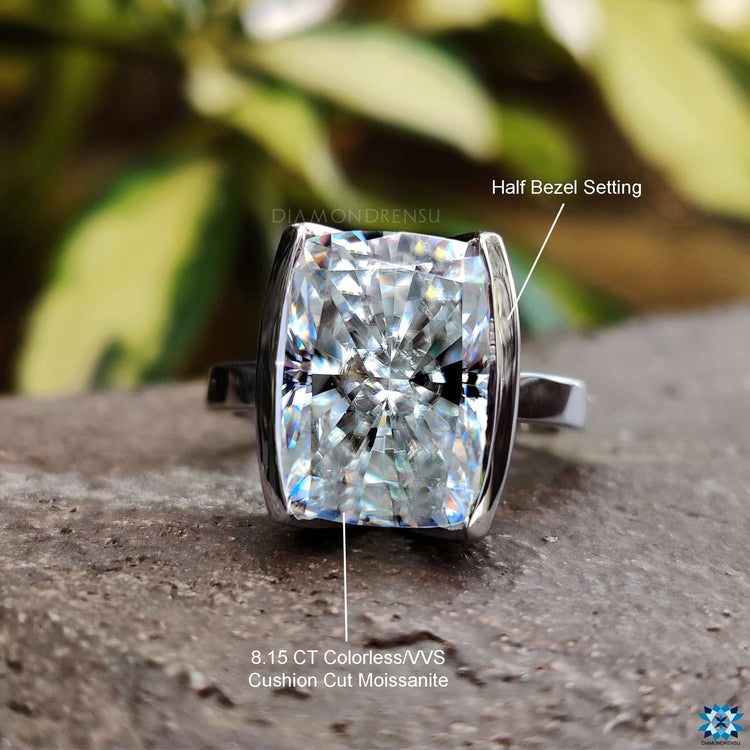 Half bezel solitaire engagement ring made with precision.