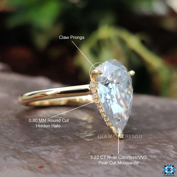 A handcrafted diamondrensu ring featuring a pear-shaped design with a 3-prong ring setting.