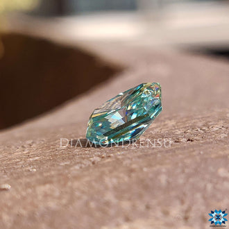 Loose moissanite stone in radiant cut, 1.85 carat weight, and rich blue shade.