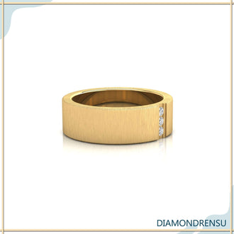 Rose gold wedding band with three stone diamond accents.