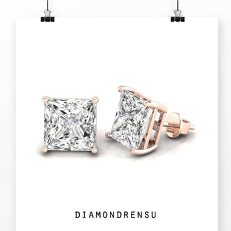 Timeless princess cut diamonds earrings in a four-prong stud earring setting.