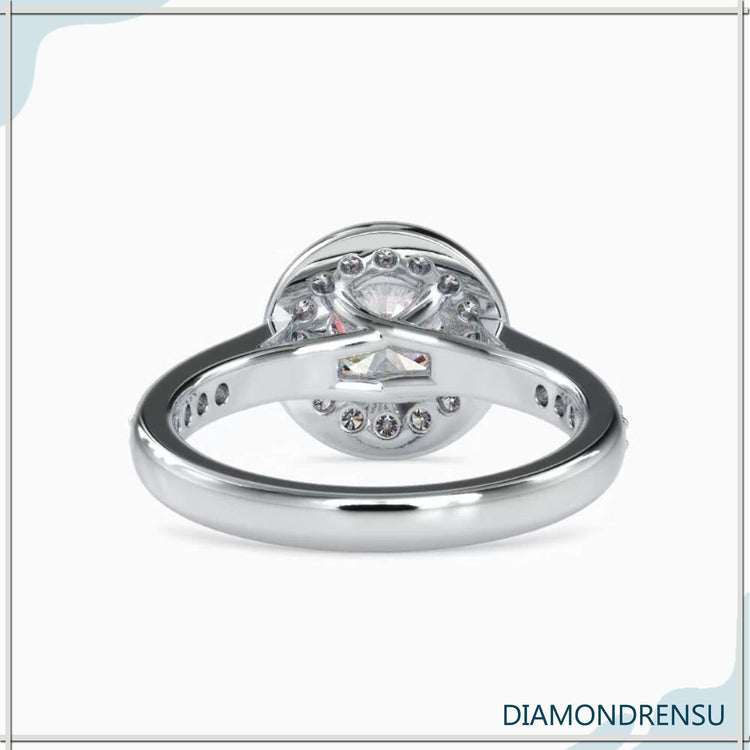 Elegant pave setting featuring a round halo diamond for added brilliance.