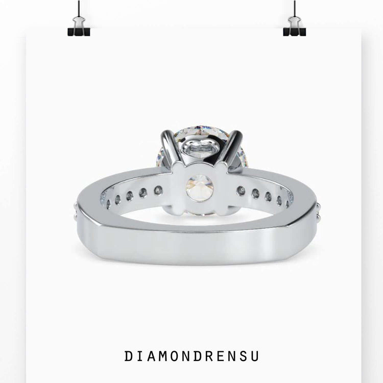 4 prong engagement ring with a secure and elegant round diamond setting.