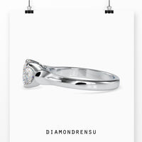 Round brilliant cut diamond ring for a chic engagement look.
