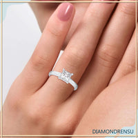 Princess cut diamond ring featuring a solitaire design and handmade jewelry craftsmanship.