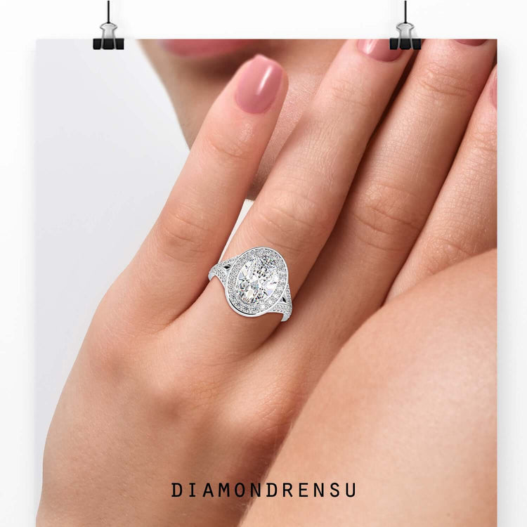 Handmade oval cut diamond engagement ring in prong setting, rose gold