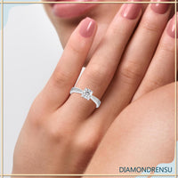 2 carat round diamond ring in a pave engagement ring setting for added sparkle.